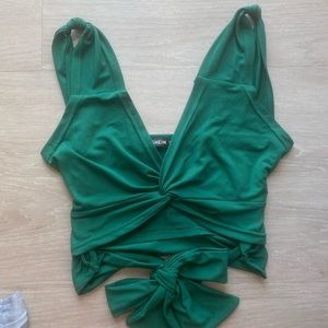 Green twist front tie back tank top with cut out
